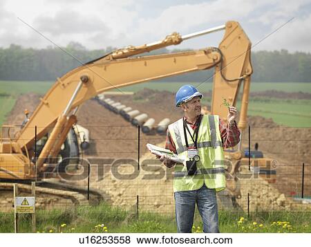 Stock Photo - Ecologist Near Construction Site. Fotosearch