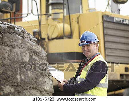 Ecologist With Heavy Machinery View Large Photo Image Stock Image - Ecologist With Heavy Machinery. Fotosearch