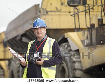 Ecologist With Heavy Machinery View Large Photo Image Stock Photo - Ecologist With Heavy Machinery. Fotosearch