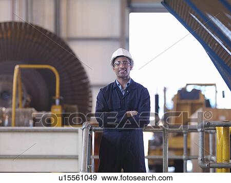 Stock Photo - Engineer In Turbine Hall. Fotosearch