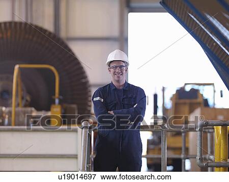Stock Photo - Engineer In Turbine Hall. Fotosearch