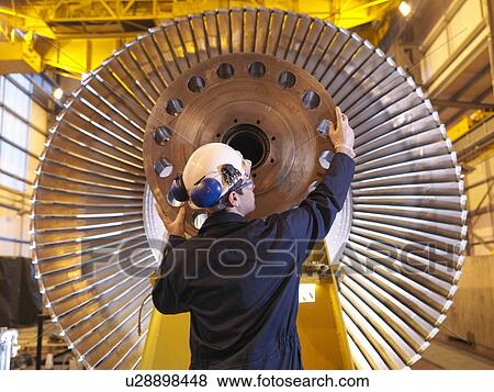 Engineer Inspecting Turbine View Large Photo Image Stock Photo - Engineer Inspecting Turbine. Fotosearch