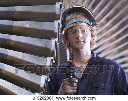 Engineer Next To Turbine View Large Photo Image Stock Image - Engineer Next To Turbine. Fotosearch