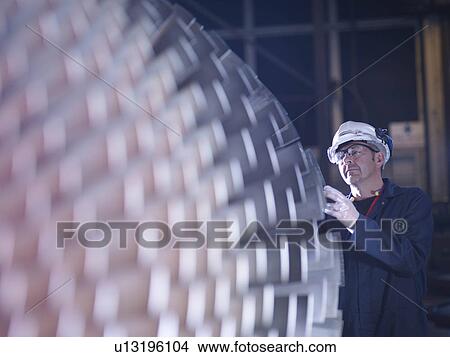 Engineer With Turbine View Large Photo Image Picture - Engineer With Turbine. Fotosearch