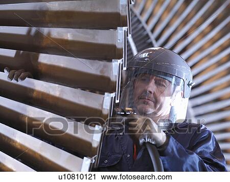 Engineer Working On Turbine View Large Photo Image Stock Image - Engineer Working On Turbine. Fotosearch
