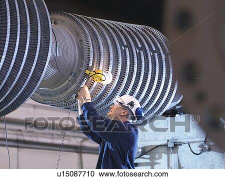 Engineer Working On Turbine View Large Photo Image Stock Image - Engineer Working On Turbine. Fotosearch