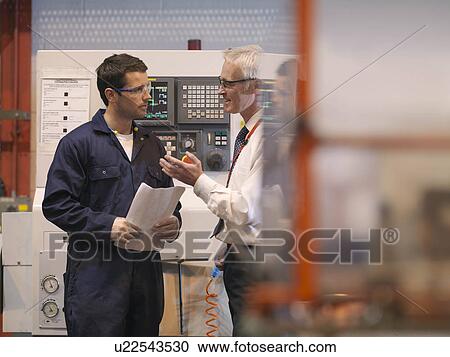 Engineers In Front Of Machine View Large Photo Image Stock Image - Engineers In Front Of Machine. Fotosearch