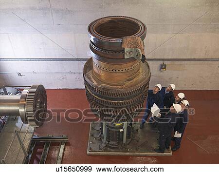 Engineers Working On Turbine View Large Photo Image Stock Photo - Engineers Working On Turbine. Fotosearch