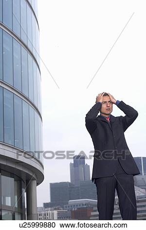 Stock Image - exasperated businessman. Fotosearch