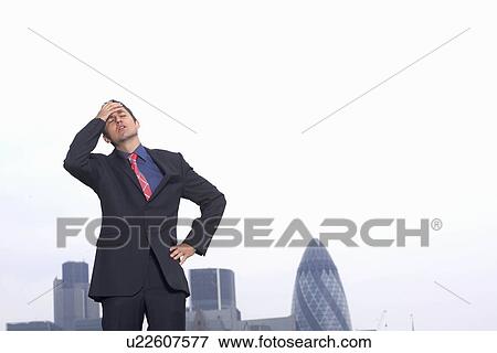 Stock Photo - exasperated businessman. Fotosearch
