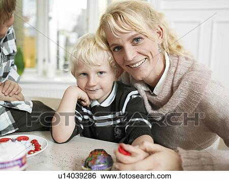 Family making Cupcakes View Large Photo Image Stock Photograph - Family making Cupcakes. Fotosearch