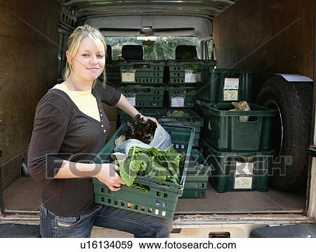 farm worker loading van View Large Photo Image Stock Photo - farm worker loading van. Fotosearch