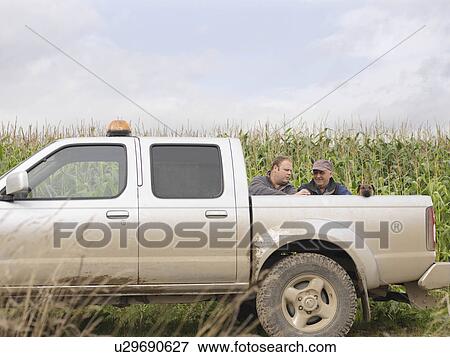 Farmers And Dog With Pickup Truck View Large Photo Image Stock Photo - Farmers And Dog With Pickup Truck. Fotosearch