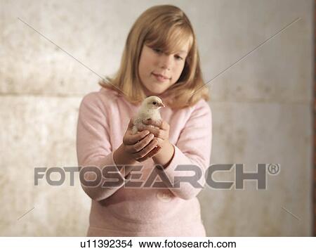 Girl Holding Chick View Large Photo Image Picture - Girl Holding Chick. Fotosearch
