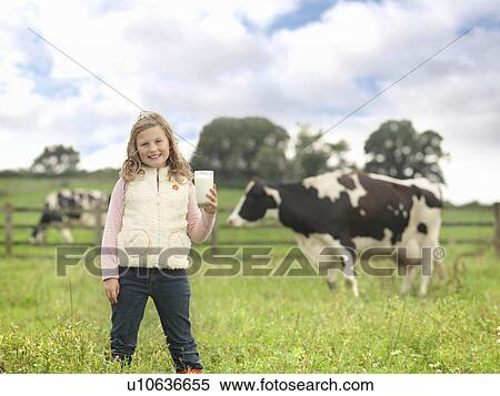 Girl Holding Milk With Cow View Large Photo Image Stock Photography - Girl Holding Milk With Cow. Fotosearch