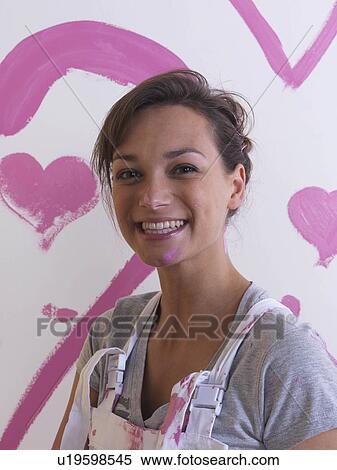 Girl in front pink hearts. View Large Photo Image Stock Photography - Girl in front pink hearts.. Fotosearch