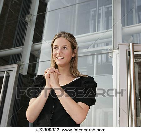 Girl outside building View Large Photo Image Stock Photo - Girl outside building. Fotosearch