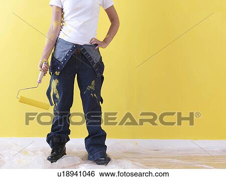 Stock Photograph - Girl painting.. Fotosearch
