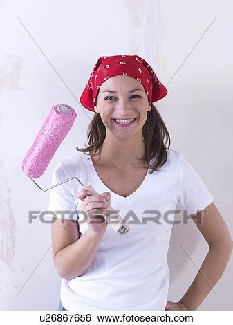 Stock Photograph - Girl painting.. Fotosearch