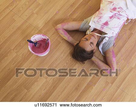 Stock Image - Girl taking a nap.. Fotosearch