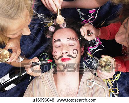 girls making up sleeping friend View Large Photo Image Stock Photo - girls making up sleeping friend. Fotosearch