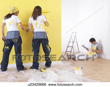 Girls painting man takes break. View Large Photo Image Stock Photograph - Girls painting man takes break.. Fotosearch