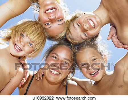 Stock Image - Group of kids smiling at camera. Fotosearch