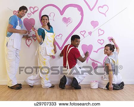 Stock Image - Group painting hearts. Fotosearch