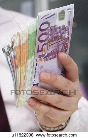 Stock Photo - Hand of businessman. Fotosearch