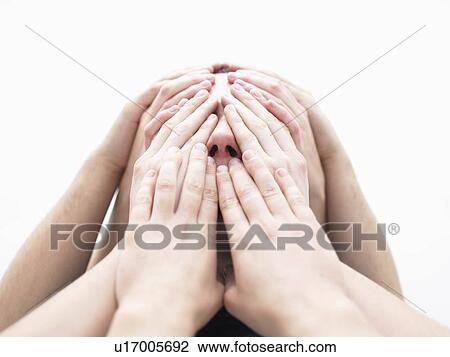 Hands covering mans face View Large Photo Image Stock Image - Hands covering mans face. Fotosearch