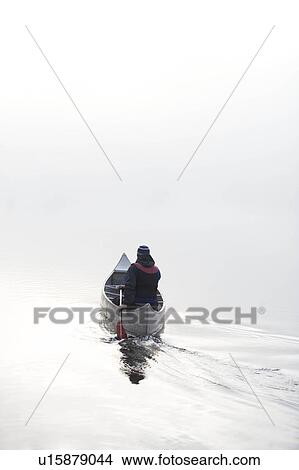 Kayaking in the morning mist. View Large Photo Image Picture - Kayaking in the morning mist.. Fotosearch