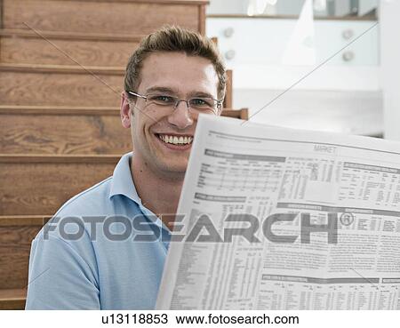Male reading the paper. View Large Photo Image Stock Image - Male reading the paper.. Fotosearch