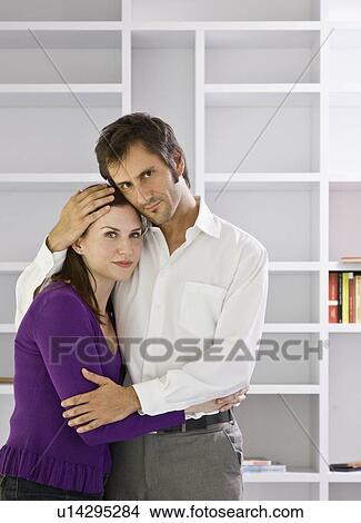 Picture - Man and woman embracing. Fotosearch