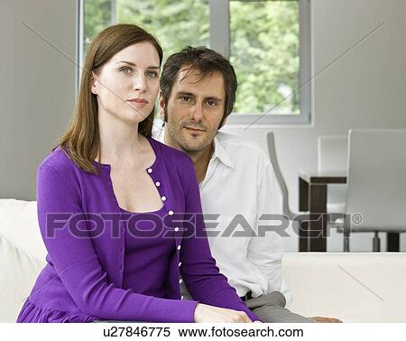 Stock Photography - Man and woman embracing. Fotosearch