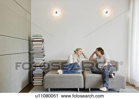 Stock Image - Man and woman talking. Fotosearch