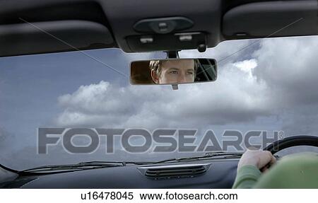 Stock Photography - Man driving car. Fotosearch