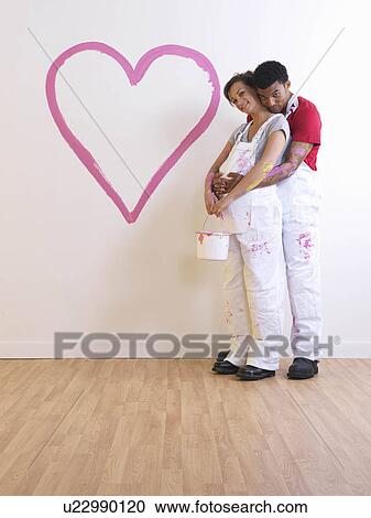 Man holds pregnant girl. View Large Photo Image Stock Image - Man holds pregnant girl.. Fotosearch
