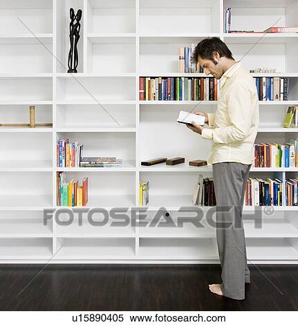 Man reading a book View Large Photo Image Stock Photography - Man reading a book. Fotosearch