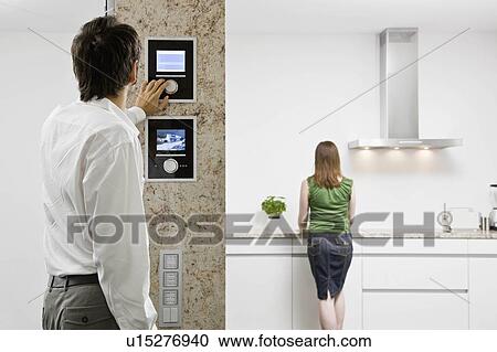 Stock Image - Man tuning the radio. Fotosearch