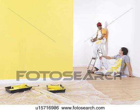 Men take a break from painting. View Large Photo Image Stock Photograph - Men take a break from painting.. Fotosearch