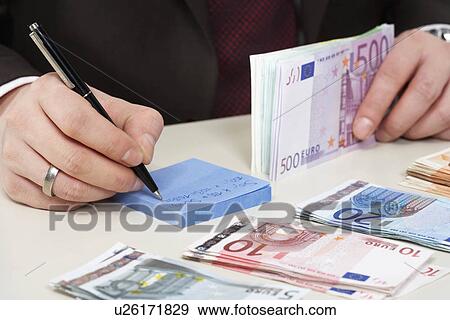Money on desk View Large Photo Image Stock Photo - Money on desk. Fotosearch