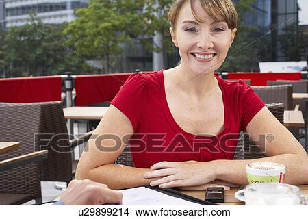 office workers outside drinking coffee View Large Photo Image Picture - office workers outside drinking coffee. Fotosearch