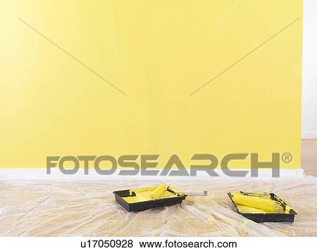 Stock Photo - Paint rollers on the floor.. Fotosearch