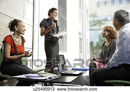 Stock Image - People with good attitude, working. Fotosearch
