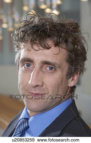 Stock Photo - Portrait, businessman at bar. Fotosearch