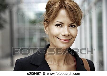 Stock Photo - Portrait of a business woman. Fotosearch