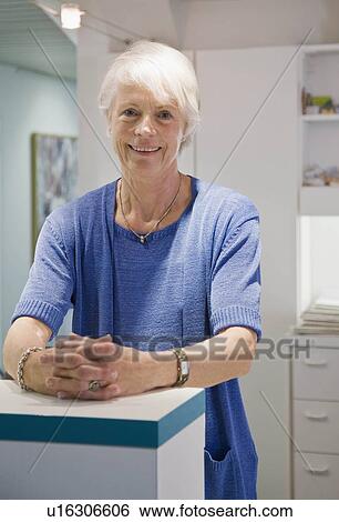 Stock Photograph - Portrait of a dental office manager. Fotosearch