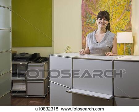 Stock Photography - Portrait of a dental receptionist. Fotosearch