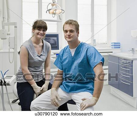 Portrait of a dentist with assistant View Large Photo Image Stock Image - Portrait of a dentist with assistant. Fotosearch