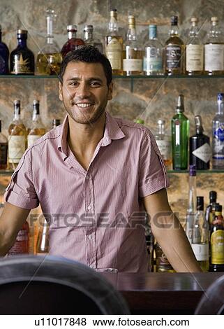 Stock Photo - Portrait of a male bartender. Fotosearch